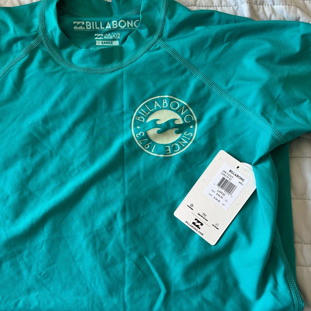 Teal Billabong swim shirt
